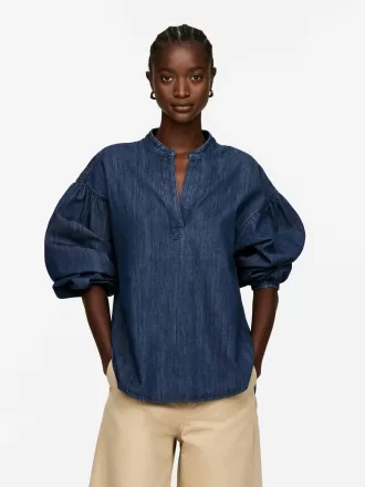 Jeansbluse mit voluminösen Ärmeln