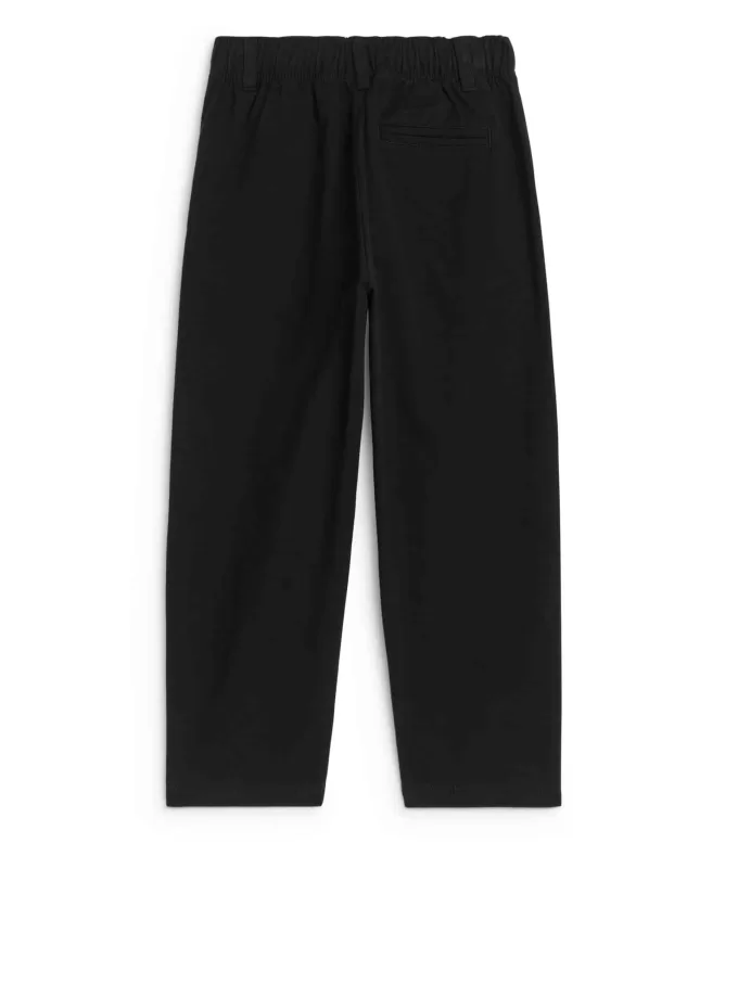 Schmal zulaufende Baumwoll-Chinos Schmal zulaufende Baumwoll-Chinos