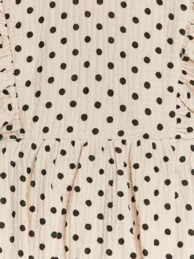 Strampler aus Musselin mit Rüschen Strampler aus Musselin mit Rüschen